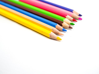 Color pencils on white, copy space