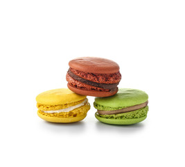 Tasty macarons on white background