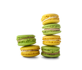 Tasty macarons on white background