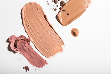 Samples of cosmetic products on light background