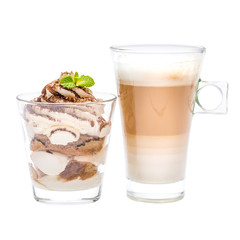 Classic tiramisu dessert in a glass and cup of coffee isolated on a white background with clipping path