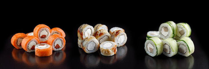 Classic sushi roll. Sushi at black background.Japanese seafood sushi , sushi a black background.