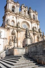 Fototapeta premium Exterior front of the Alcobaca Monastery, or Mosteiro de Santa Maria de Alcobaca, in Portugal. No people.