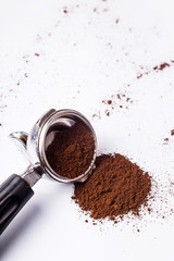 Tool for making professional espresso coffee on a gray table