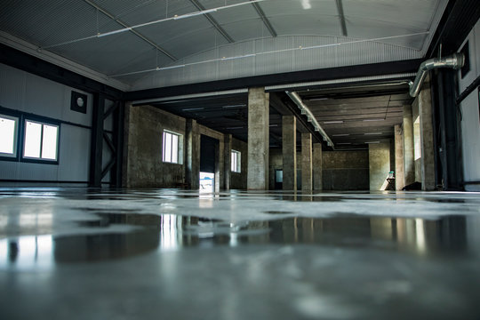 Empty Hangar With Wet Floor, Reflection, Space