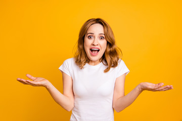 Close up photo beautiful amazing she her lady arms hands raised up look unexpected yelling screaming shouting football goal fan lucky wear casual white t-shirt isolated yellow bright background