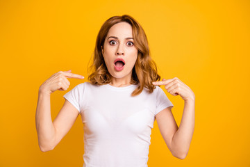 Close up photo beautiful she her lady yell shout scream raised arms hands index fingers direct not my fault chest oh no expression open mouth wear casual white t-shirt isolated yellow background