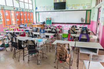 Perspective detail view of empty or school or university classroom.
