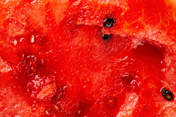 watermelon cross section as background and texture - obrazy, fototapety, plakaty