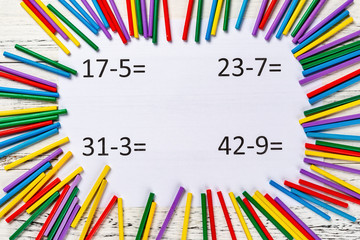 top view subtraction equations with colorful counting rods