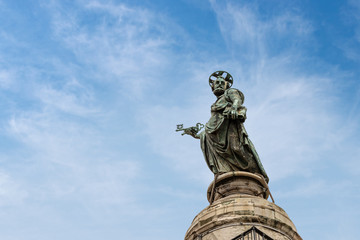 Fototapeta na wymiar Statue of Saint Peter - Trajan column in Rome Italy