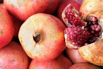 Closeup pomegranate at market stall in southern Spain