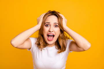 Close up photo beautiful she her lady yelling raise arms hands hold head hairdo lost epic fail football match game fan loser oh no expression wear casual white t-shirt isolated yellow background