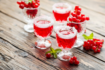 Red currant liquor with sugar and mint