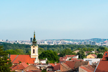 Fototapeta na wymiar Old part of the town, Panoramic view with old church tower, Zemun, Serbia