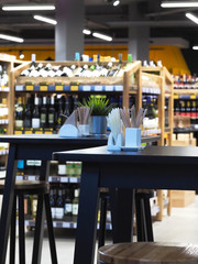 Wood table top with blur in coffee shop background