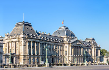 Fototapeta premium Three-quarter view of the main facade of the Royal Palace of Brussels, the official palace of the King and Queen of the Belgians in the historic center of Brussels, Belgium, on a sunny morning.