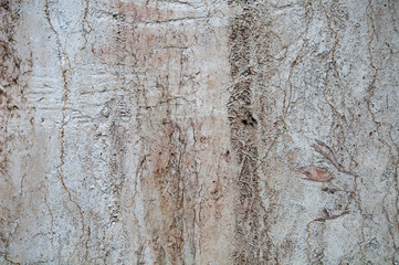 Stones background textures. Deep scratches and cracks on dirty, damaged white backgrounds.