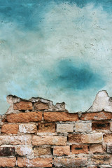 Red cracked brick wall with floor texture background.