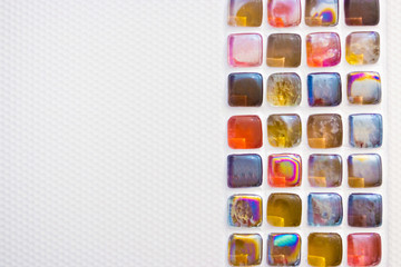 a strip of beauty small colored square mosaic caramel tiles in the bathroom, toilet, kitchen and any wall decoration