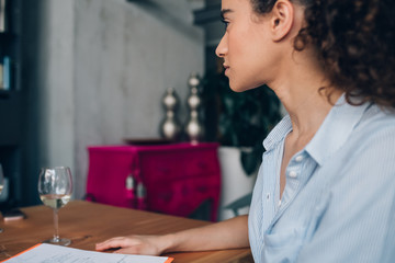 young caucasian woman sitting in modern co-working office