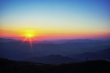 The atmosphere before the foggy sunset. View of Battle Elephant Hill (Nein Chang Suk) is a in Pilok at Ban I-tong and is surrounded by Thong Pha Phum National Park, Kanchanaburi, Thailand.