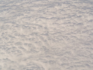 Full frame white clouds from top side view