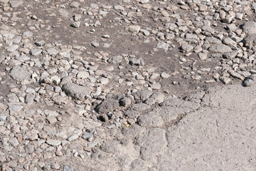 Destroyed asphalt pavement