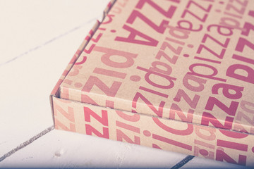 Pizza box delivery close-up