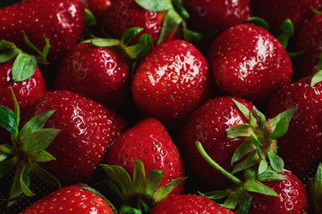 Delicious fresh, ripe strawberries with tails, texture of large strawberries