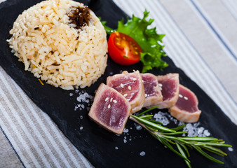 Tuna Tataki garnished with rice