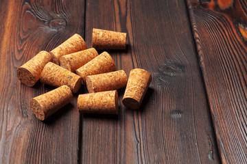 Wine corks on wooden background