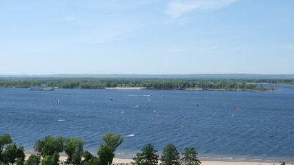 the Volga River, paragliding over the waves