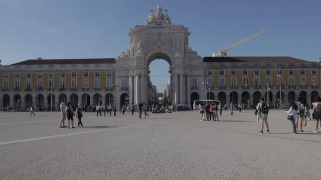 Lisbona, Portugal - March 2018: time lapse Pra&ccedil;a do Com&eacute;rcio in Lisbon, beautiful sunny day and the people walking