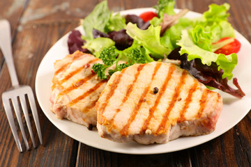 grilled pork chop and salad