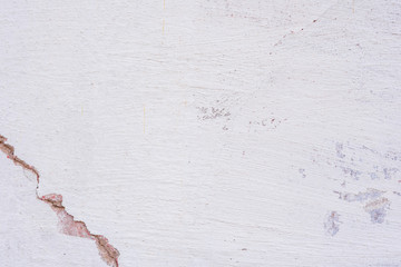Texture, wall, concrete, it can be used as a background. Wall fragment with scratches and cracks