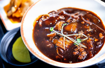 Jajangmyeon, jjajangmyeon, fried sauce noodle, delicious korean traditional noodles cuisine with korea black bean paste sauce, close up, copy space