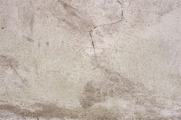Texture, wall, concrete, it can be used as a background. Wall fragment with scratches and cracks