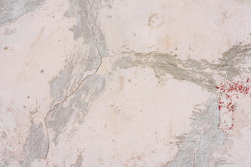 Texture, wall, concrete, it can be used as a background. Wall fragment with scratches and cracks