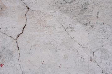 Texture, wall, concrete, it can be used as a background. Wall fragment with scratches and cracks