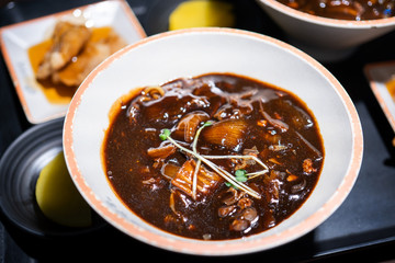 Jajangmyeon, jjajangmyeon, fried sauce noodle, delicious korean traditional noodles cuisine with korea black bean paste sauce, close up, copy space