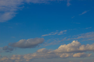 Naklejka na ściany i meble Beautiful photo of clouds in the blue sky, A flock of little clouds