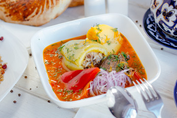 Soup with bell pepper filled with meat, with vegetables.