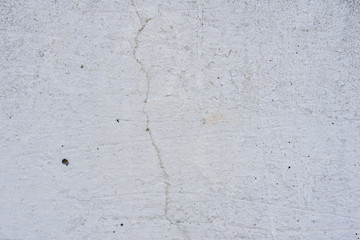 Texture, wall, concrete, it can be used as a background. Wall fragment with scratches and cracks