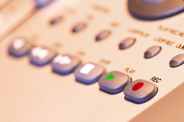 close up record button on recording studio equipment