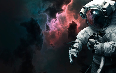 Astronaut in front of deep space landscape. Elements of this image furnished by NASA