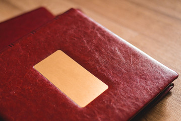 This photo shows a photo book. Photobook genuine leather. Leather. Photo products.