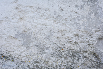 Texture, wall, concrete, it can be used as a background. Wall fragment with scratches and cracks