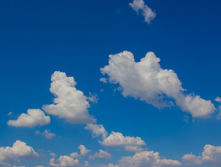 Naklejka na ściany i meble A flock of little clouds, Beautiful photo of clouds in the blue sky