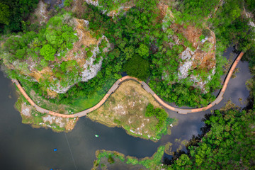 aerial over view khao ngoo mountain rock or snake mountain rock are high cliff and landmark ratchaburi province thailand